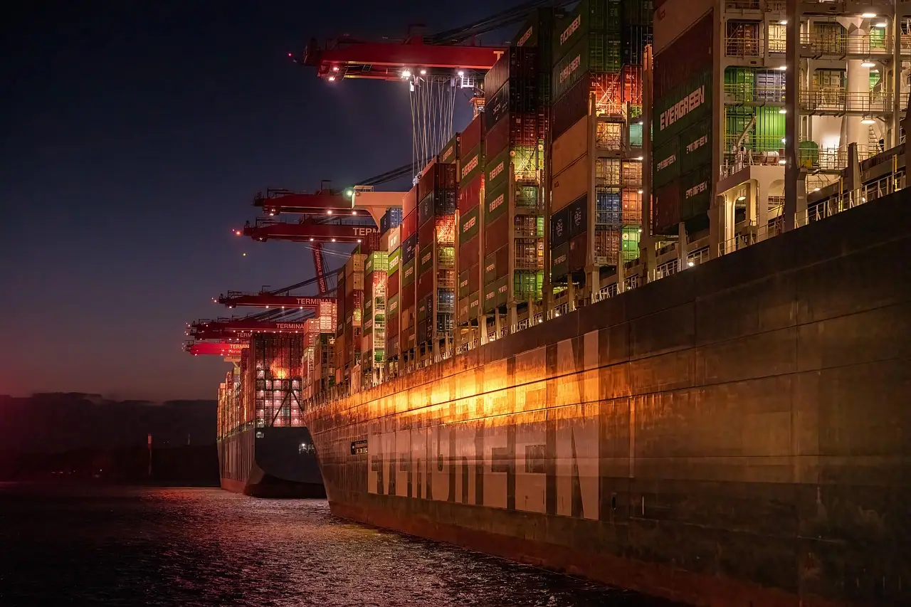 Container ship berthed at night